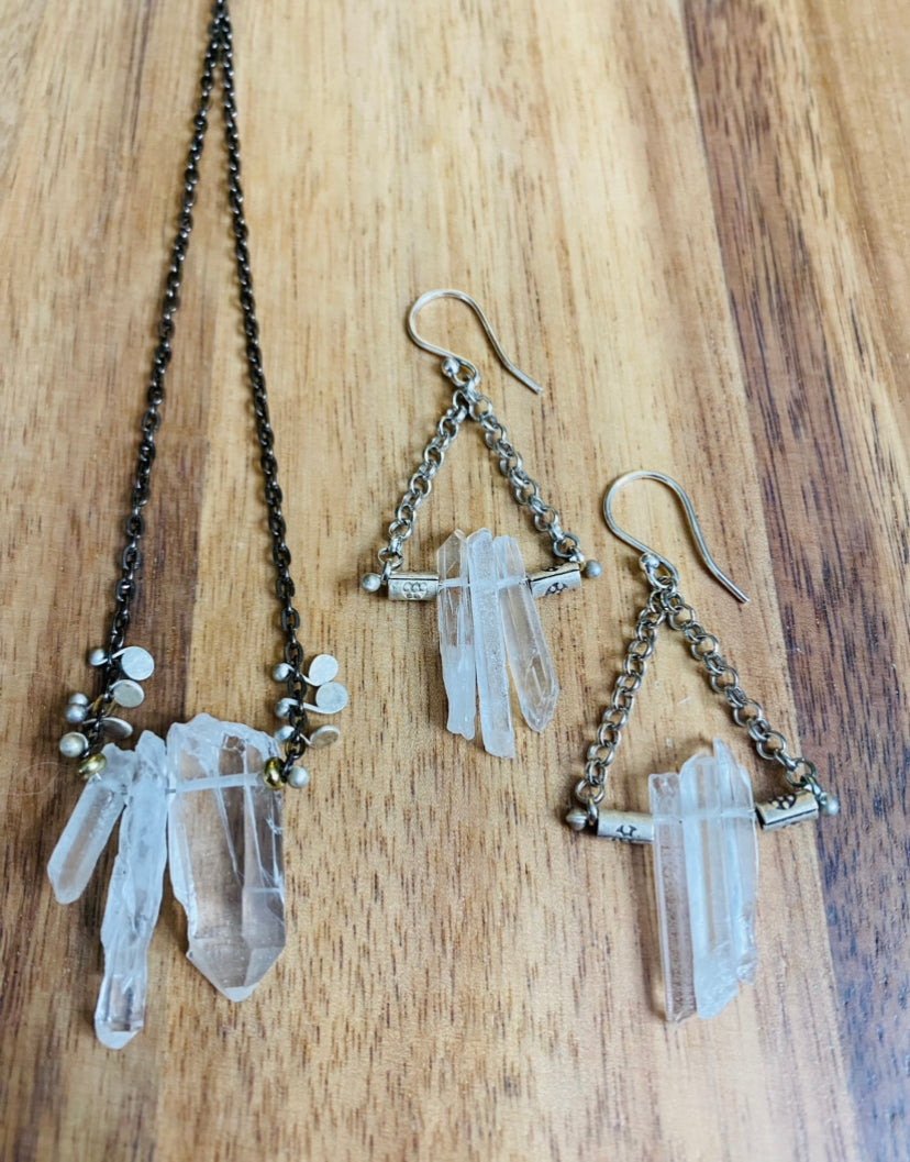 Rock crystal shard necklace with intricate metalwork