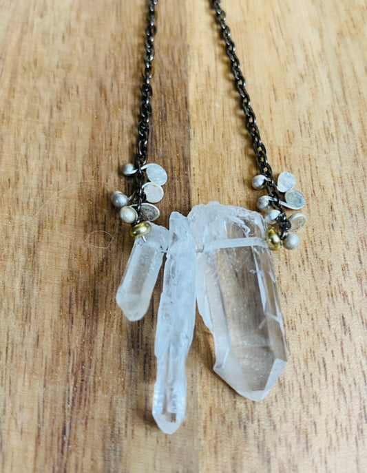 Rock crystal shard necklace with intricate metalwork
